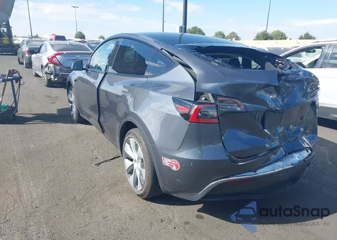 2023 Tesla Model Y Rwd из США, поврежденный, VIN 7SAYGDED0PF978241